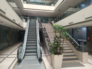 Rectangle one building escalators at lobby level